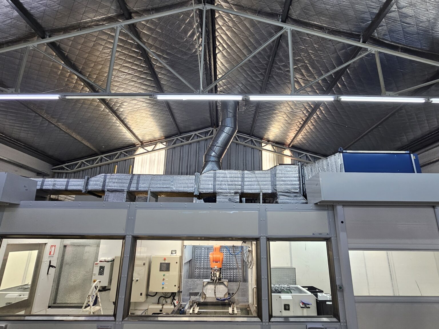 Pintado con robot de piezas plásticas